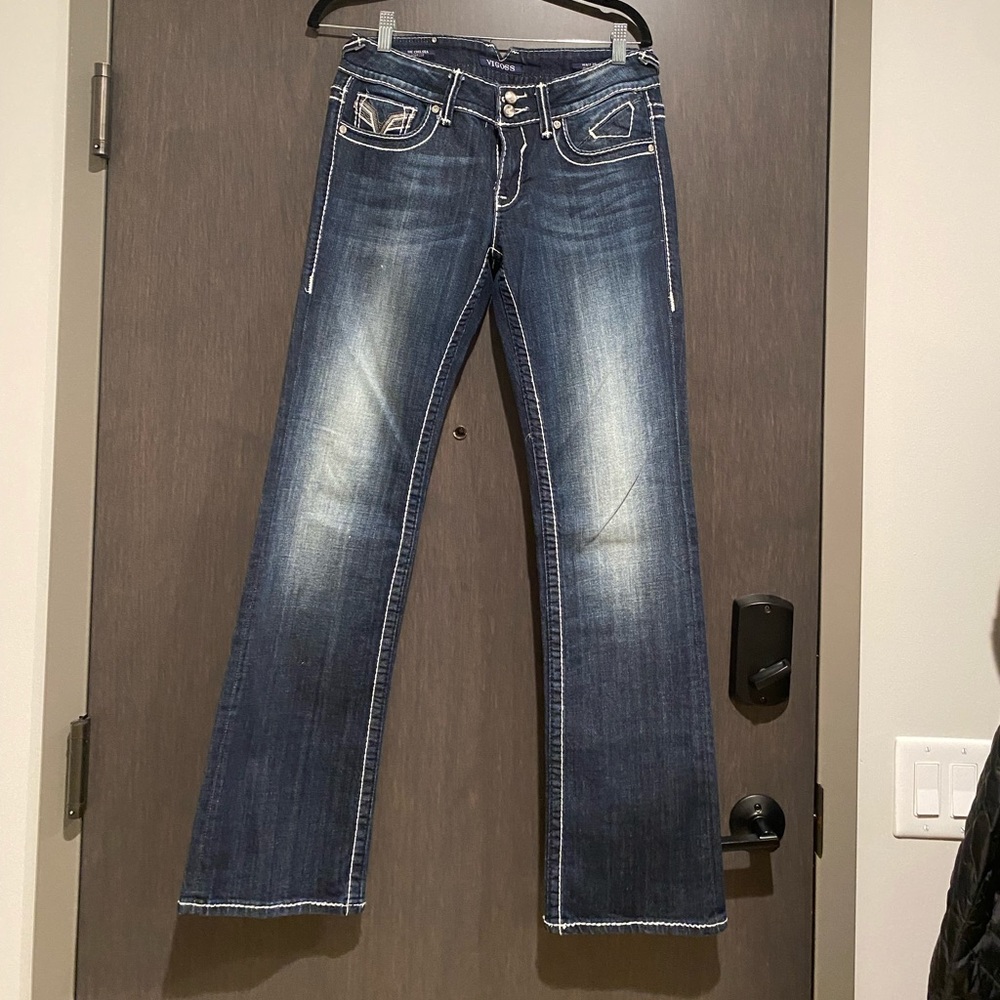 Vigoss studded + bedazzled bootcut leg denim.